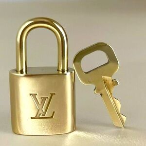 Authentic Louis Vuitton Padlock with Key.